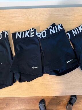 Four Pairs of Women’s Nike Pro Bike Shorts, Sz M